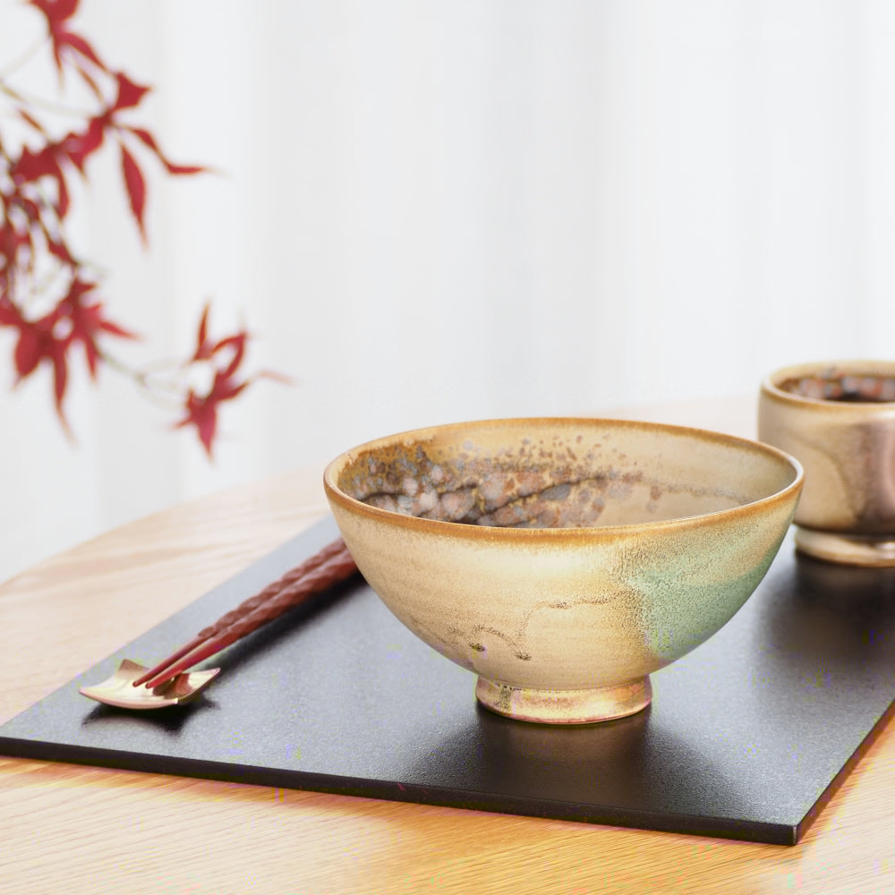 Green pottery glaze on asian bowl