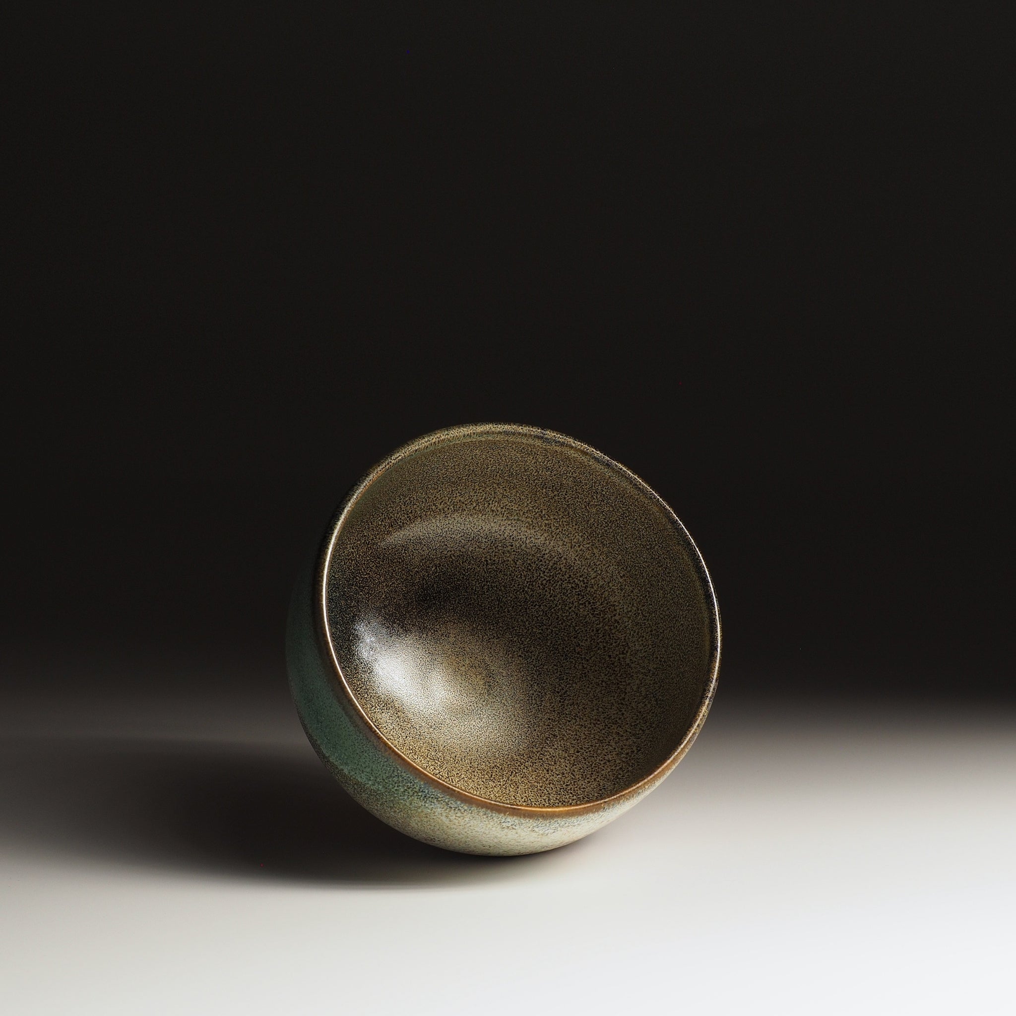 Hanagumo matcha bowl interior, deep green Nanasai Tenmoku glaze, wide opening for matcha whisking