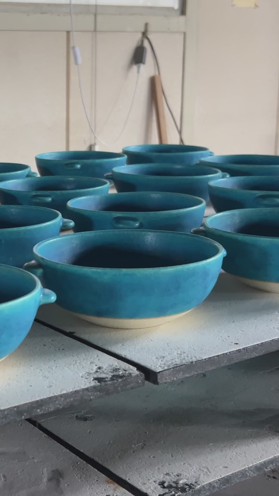 Japanese pottery out of the kiln (vertical). Tsukushi