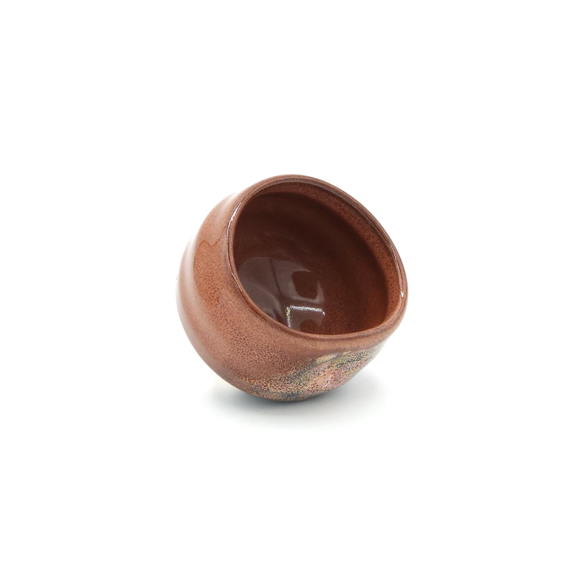A lateral view of a Japanese round sake cups. Tsukushi