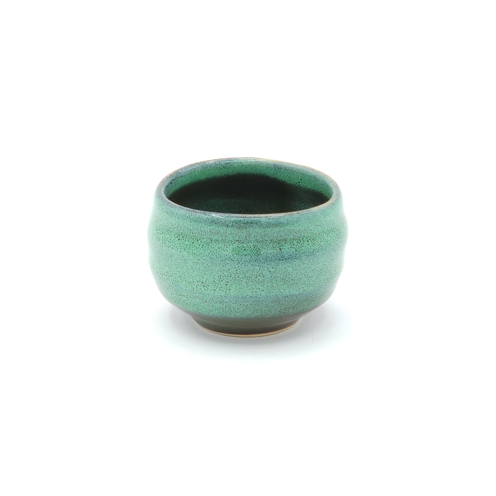 A Japanese round sake cup (green). Tsukushi
