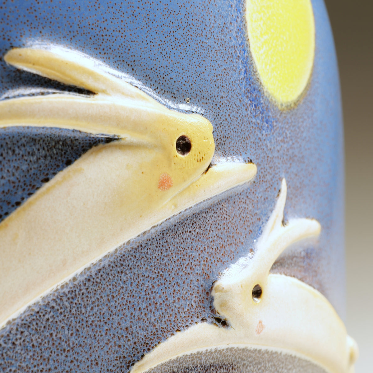 Detail of white rabbits beneath the moon on the blue glazed Tsukimi ceramic ornament by Kazuhiro Kojima.