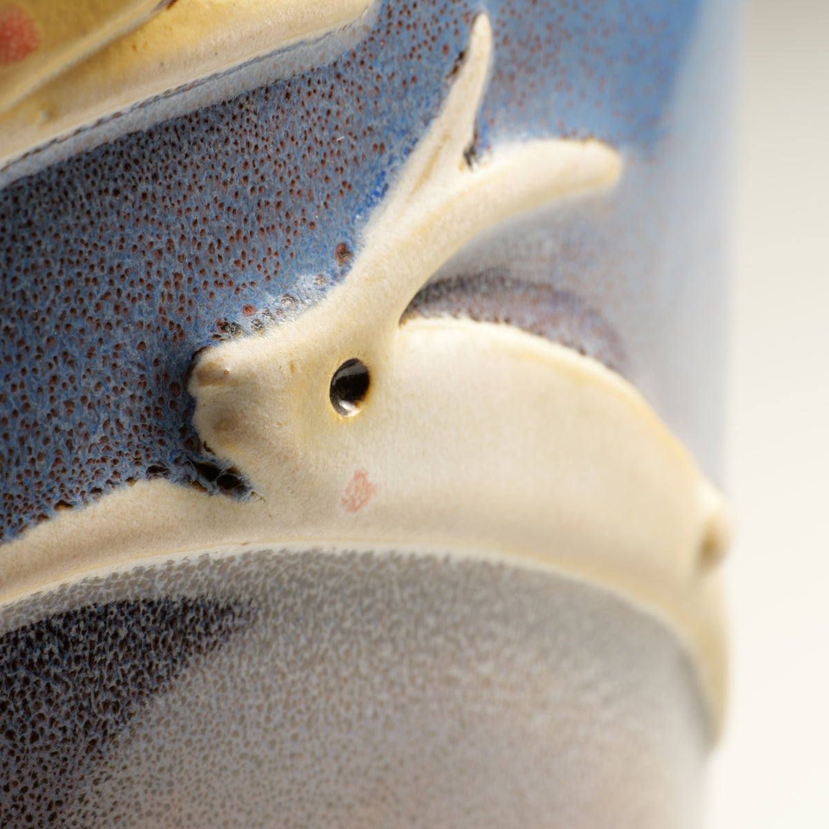 Close-up of a white rabbit on the Tsukimi ceramic ornament by Kazuhiro Kojima.