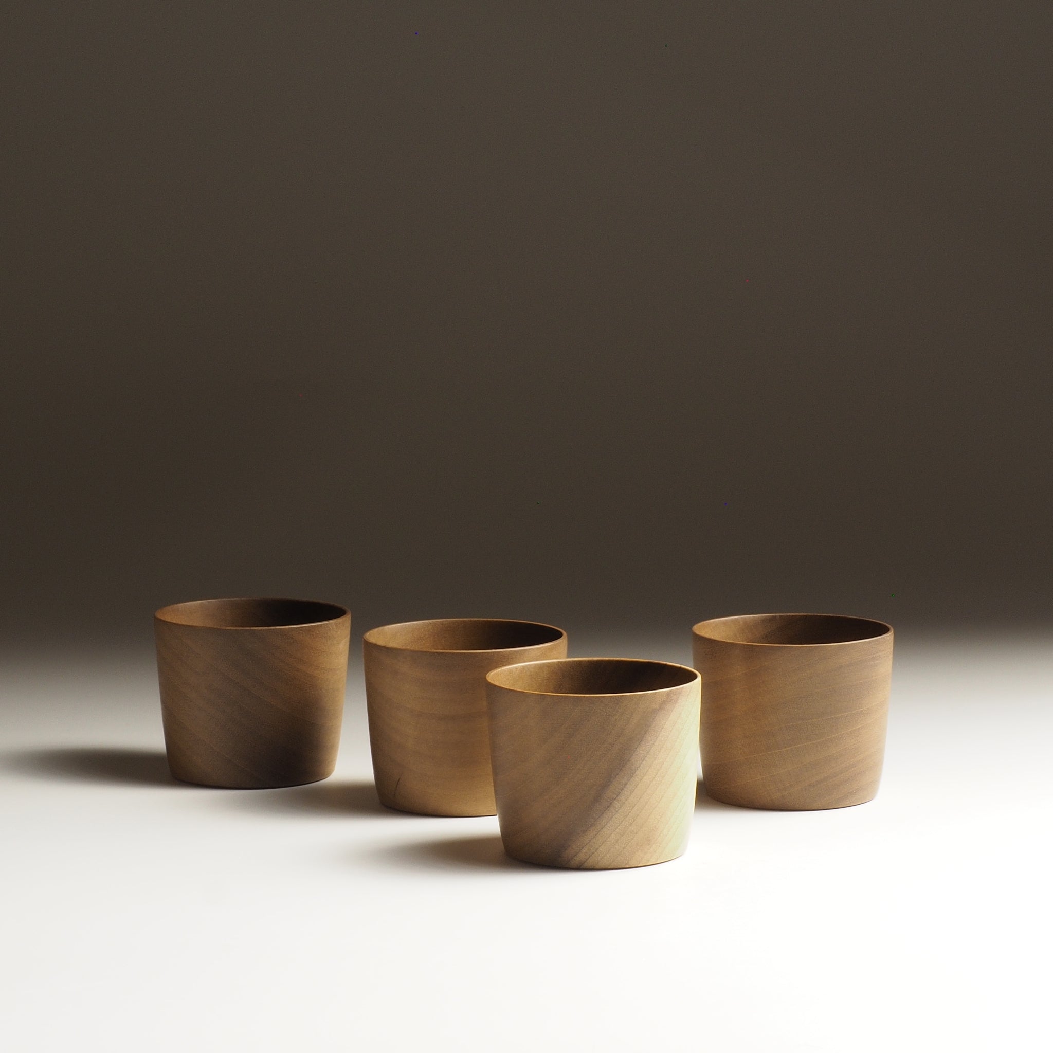 Japanese Cucumber Tree Japanese Wooden Sake cups set beige background from back, Tsukushi