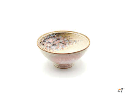 Authentic Japanese pottery bowl with cherry blossoms decoration. Pink and beige color. (side view 2).