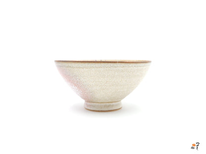 Authentic Japanese pottery bowl with cherry blossoms decoration. Pink and beige color. (side view 3).