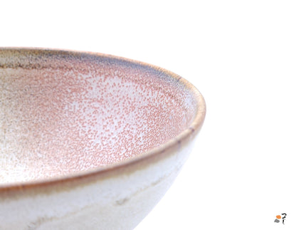 Authentic Japanese pottery bowl with cherry blossoms decoration. Pink and beige color. (side detail view 1).