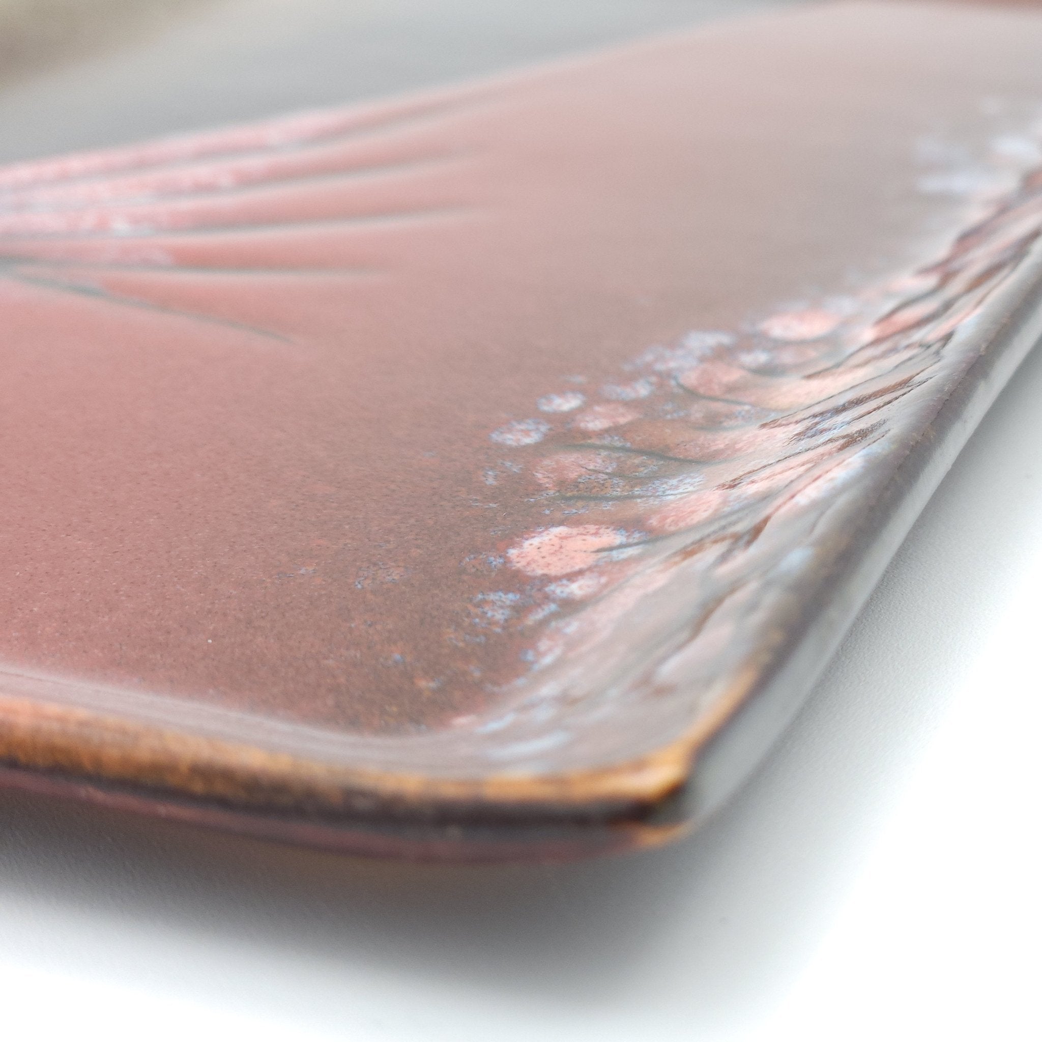 Authentic Japanese pottery rectangular plate with Mt.Fuji decoration. red and brown color.  (side detail view 1).