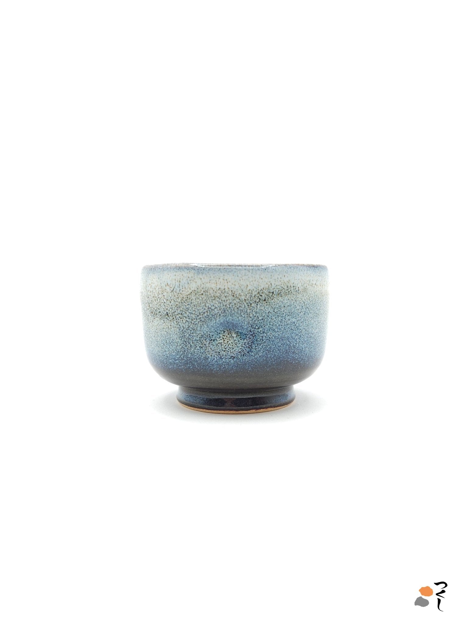 Authentic Japanese pottery teacup with tree decoration. blue and white color. (side view 2).
