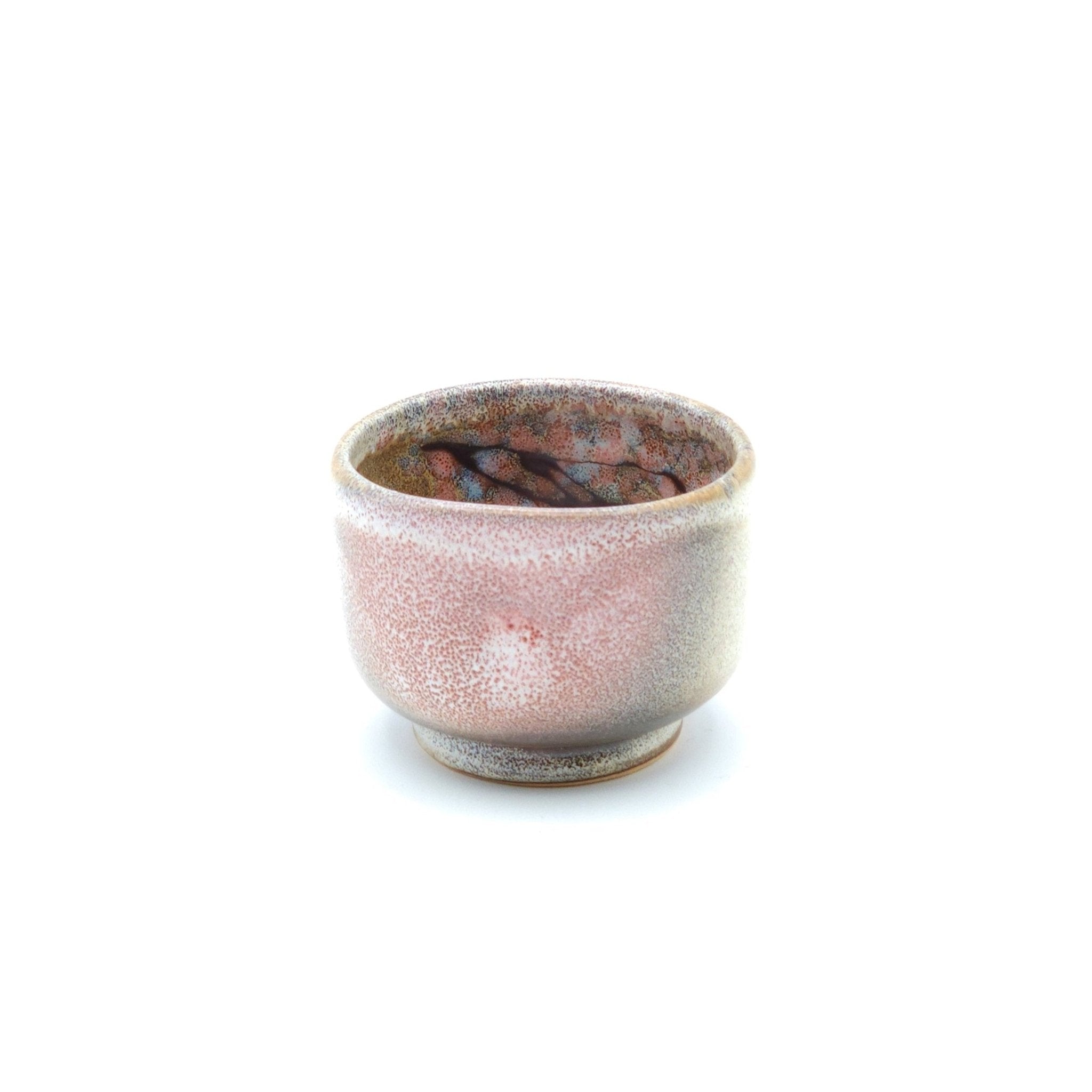 Authentic Japanese pottery teacup with cherry blossoms decoration. pick and beige color. (side view 3).