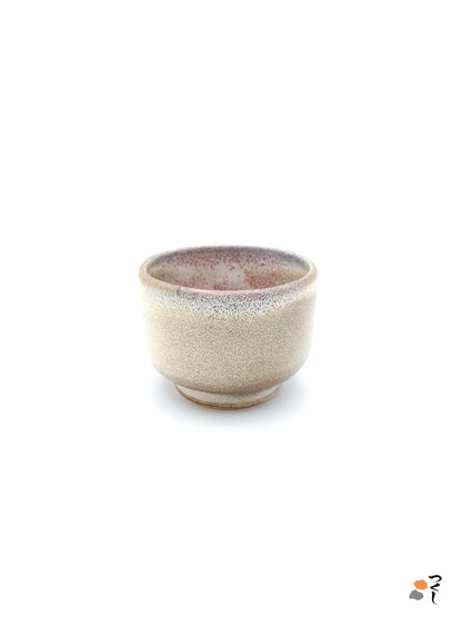 Authentic Japanese pottery teacup with cherry blossoms decoration. pick and beige color. (side view 5).