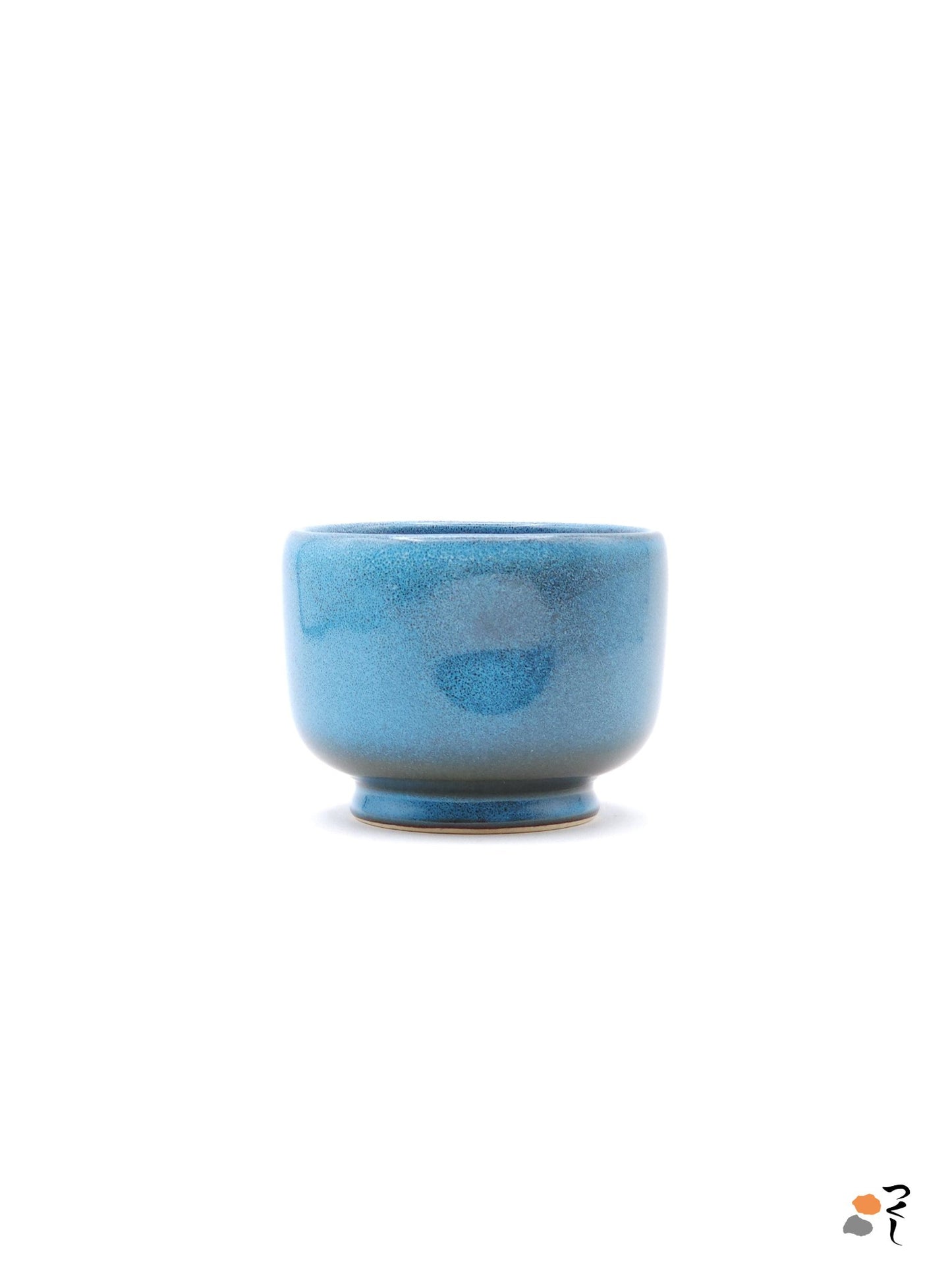 Authentic Japanese pottery teacup with tree pattern decoration. blue color. (side view 1).