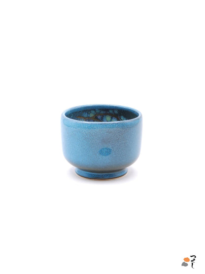 Authentic Japanese pottery teacup with tree pattern decoration. blue color. (side view 2).