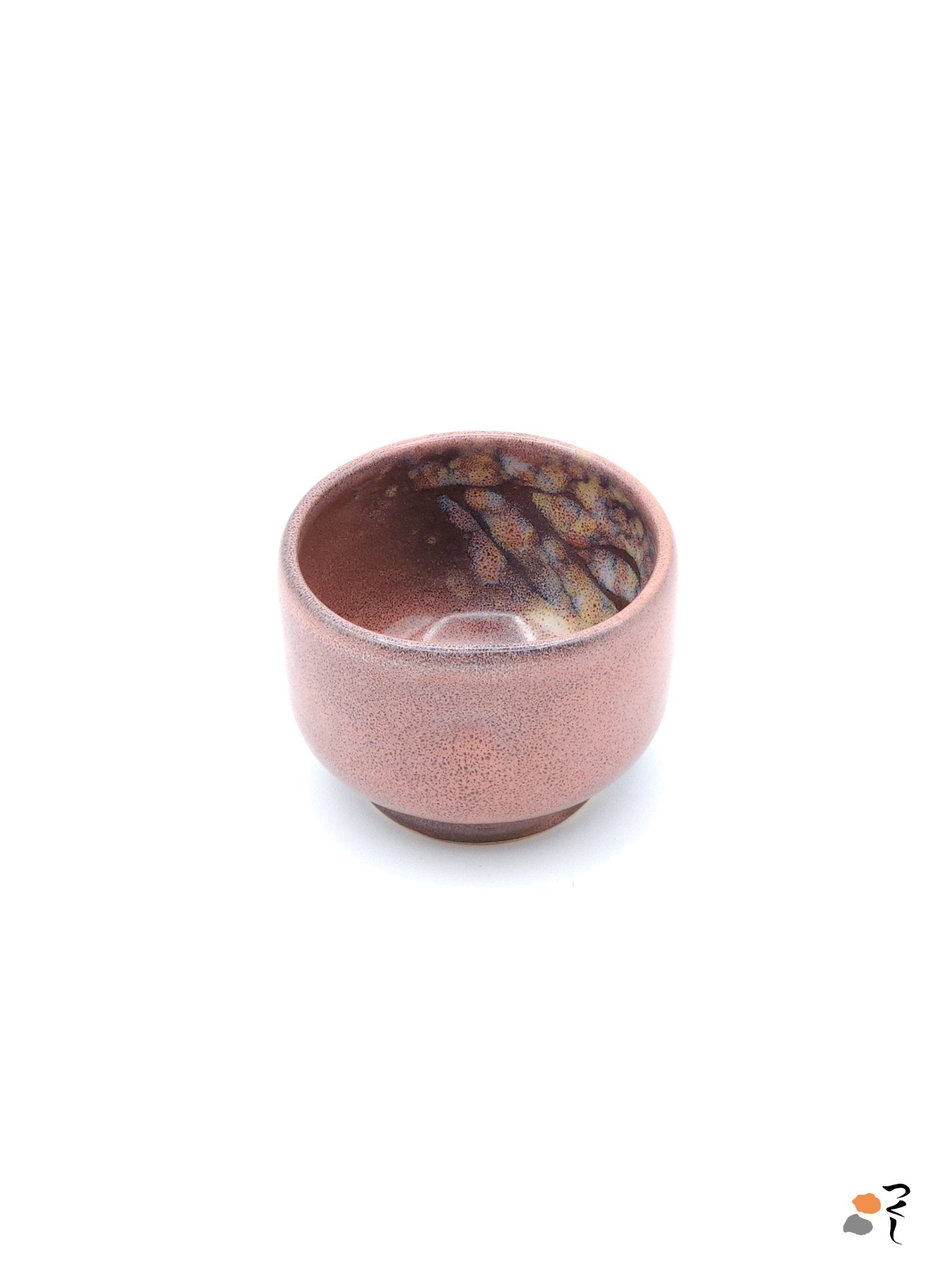 Authentic Japanese pottery teacup with tree pattern decoration. pink color. (front side view 1).