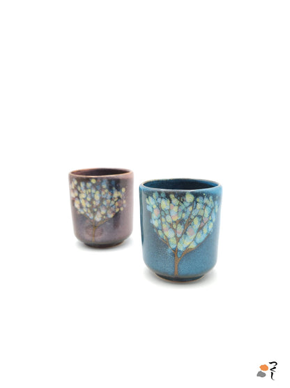 Authentic Japanese pottery teacup tall with tree pattern decoration. blue color.  (pink and blue pair view 1).