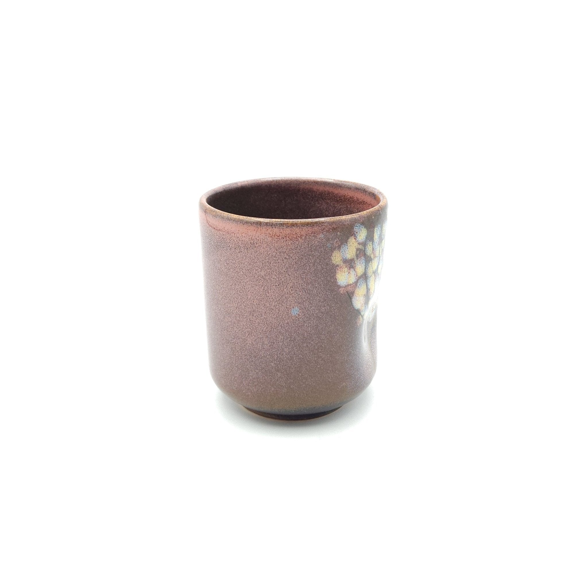 Authentic Japanese pottery teacup tall with tree pattern decoration. pink color. (side view 5).