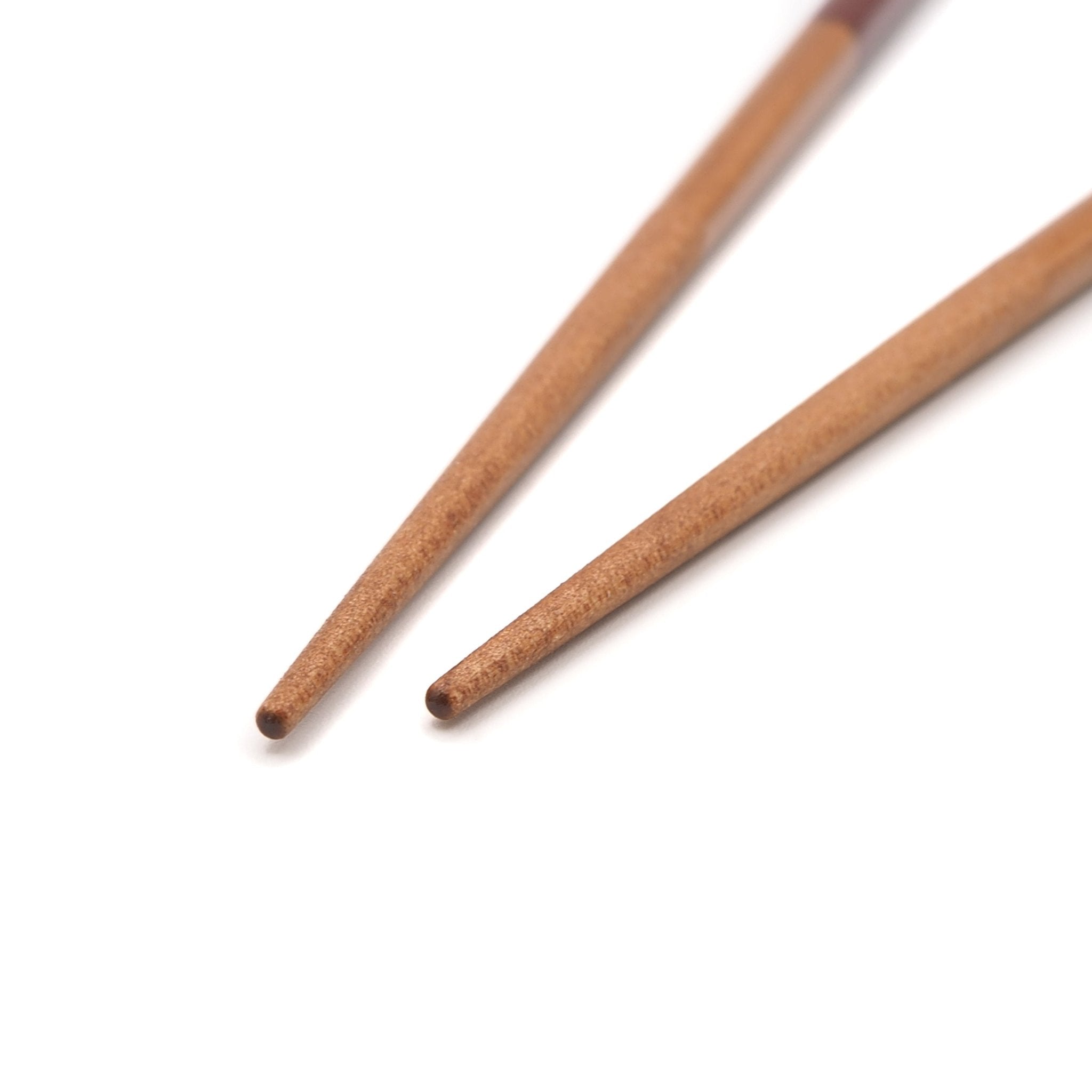 Point of red Japanese Chopsticks with golden motif 