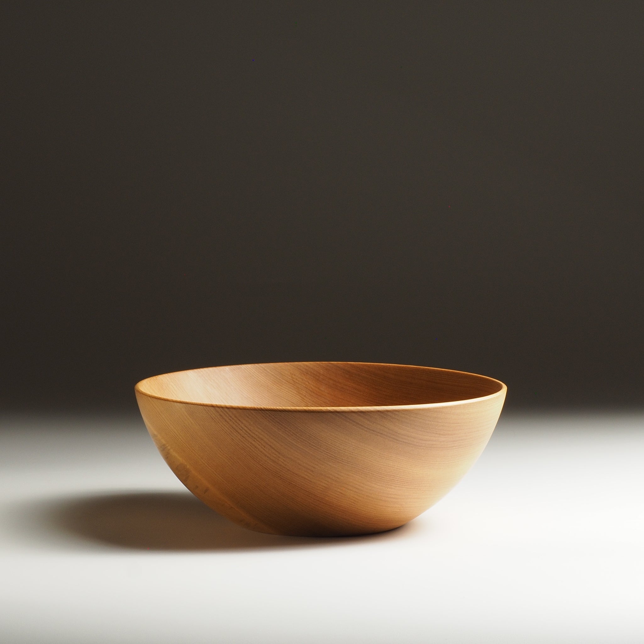 Japanese wooden bowl on a gradient background. Tsukushi