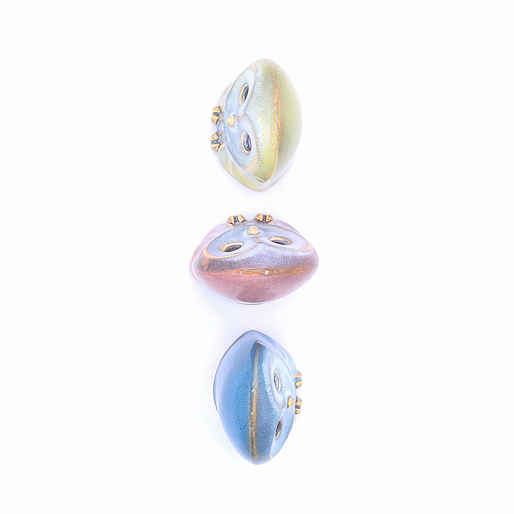 Top view of a Set of 3 Japanese Pottery owl figurines 