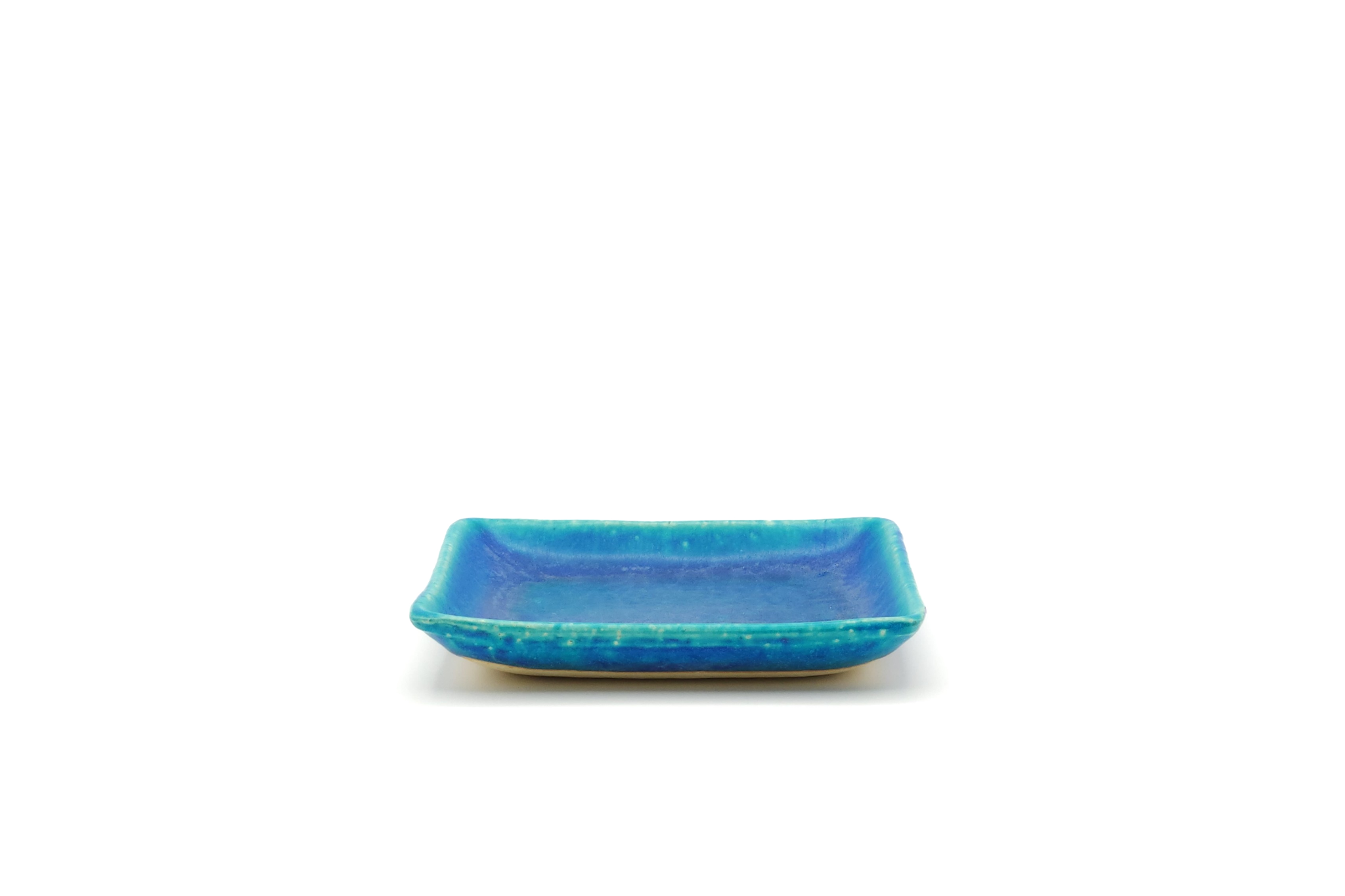 A turquoise Japanese pottery square plate