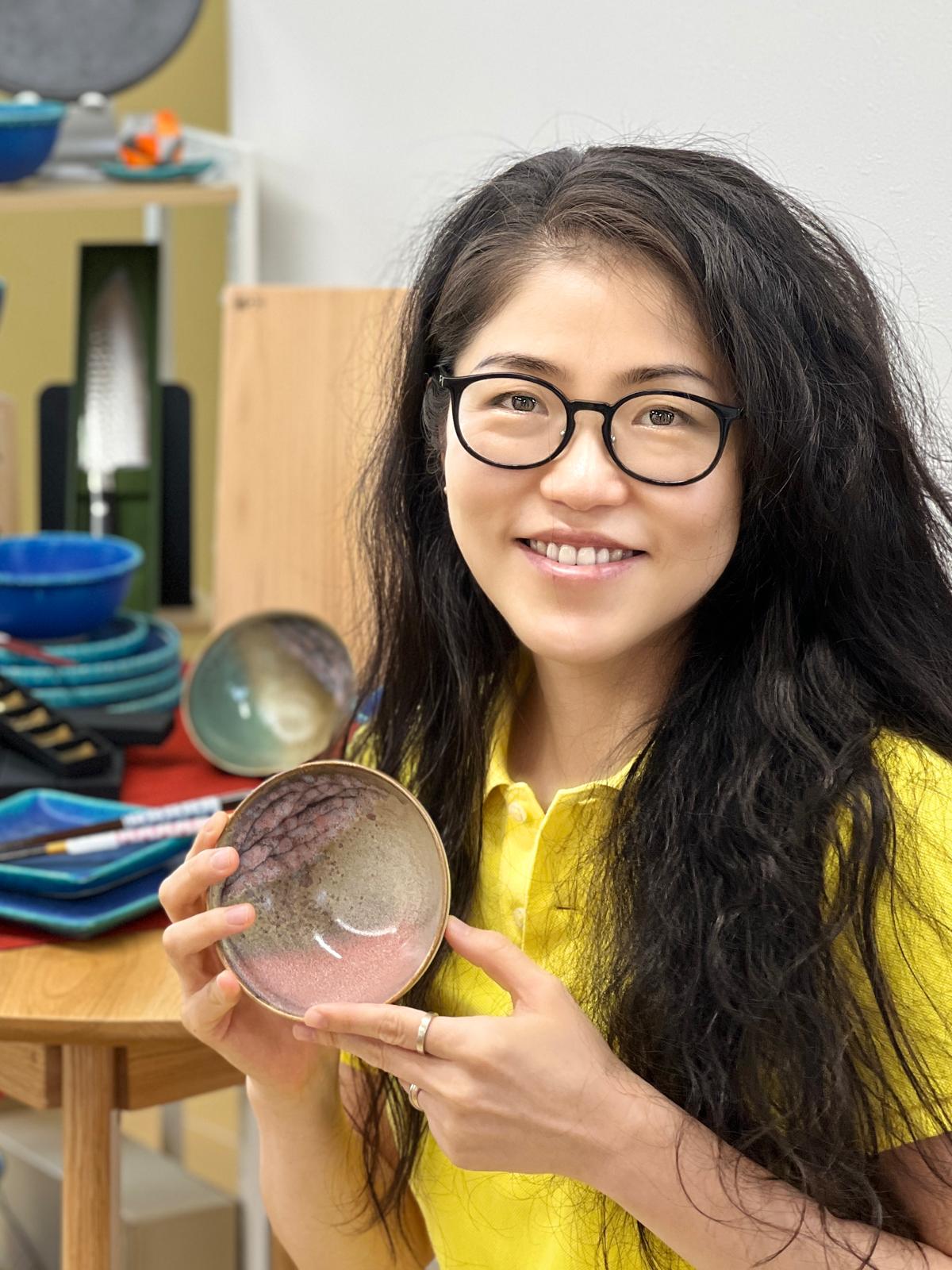 Yuri Onnis with Japanese pottery bowl