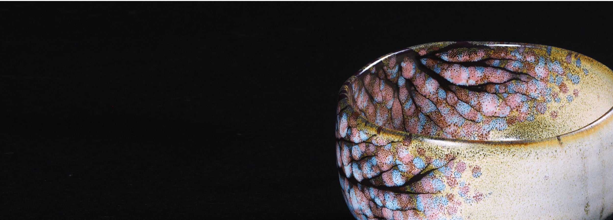 Close-up of a japanese matcha bowl  on a black background