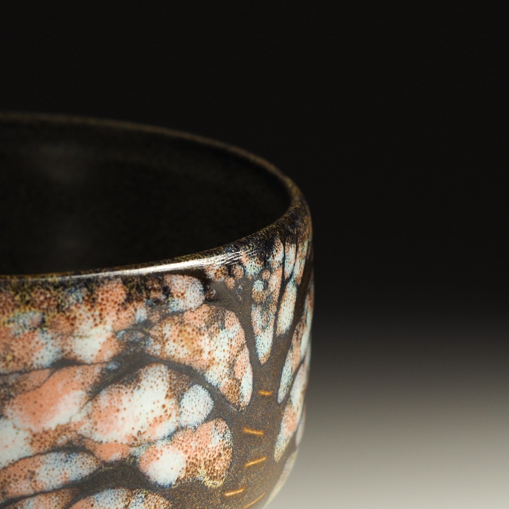 Close-up of sakura tree pattern on Hanagumo bowl, Nanasai Tenmoku glaze detail, Taro Kojima