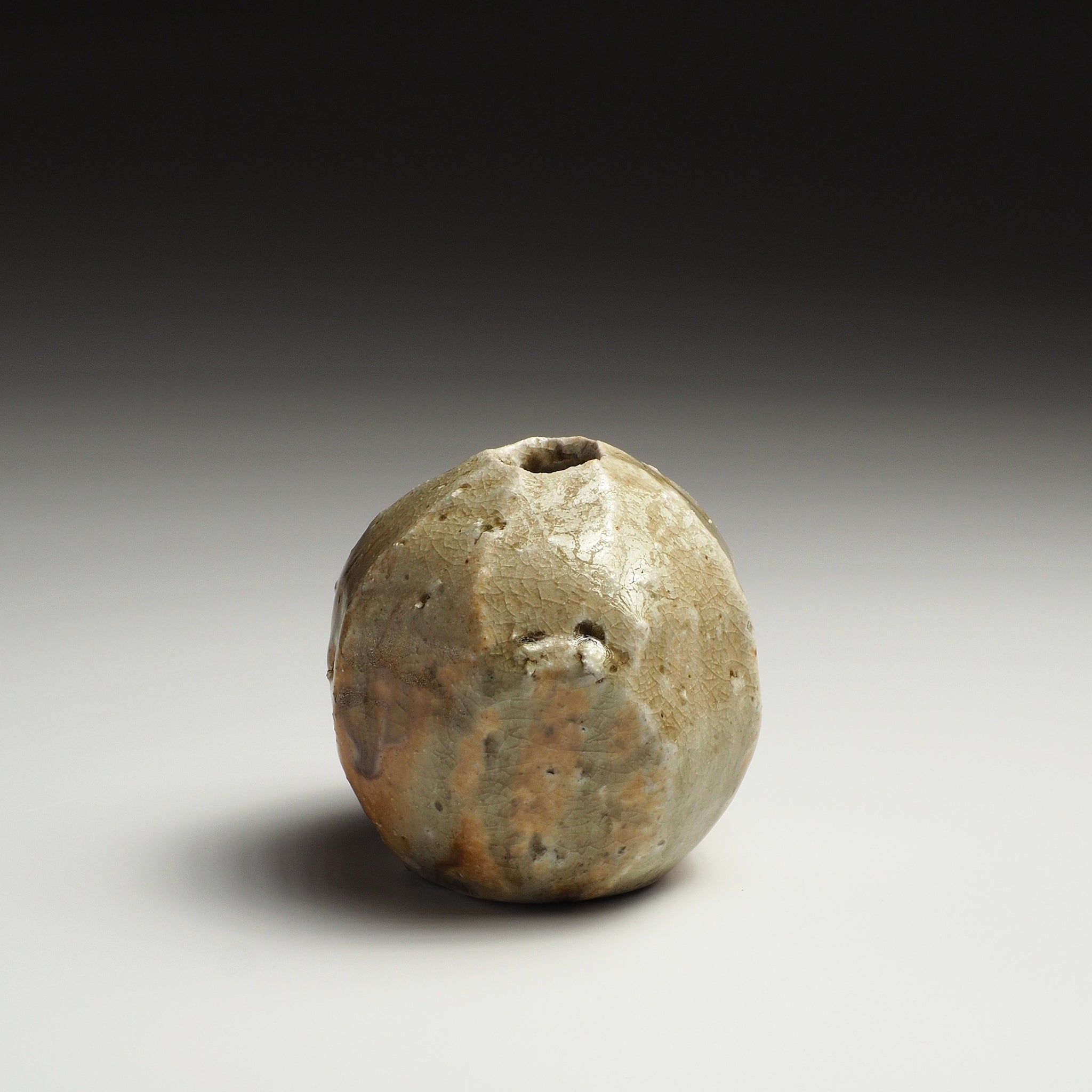 Kokeishi Shigaraki flower vase viewed from the opposite side, showing its textured beige and earthy brown surface.