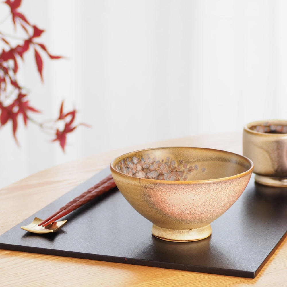 pink Japanese rice bowl with pottery glaze