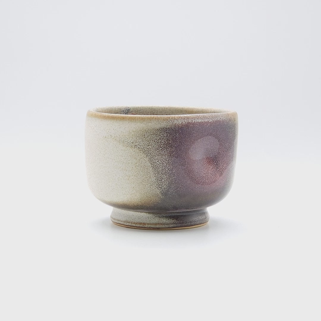 Video of a pink Japanese Pottery Teacup.