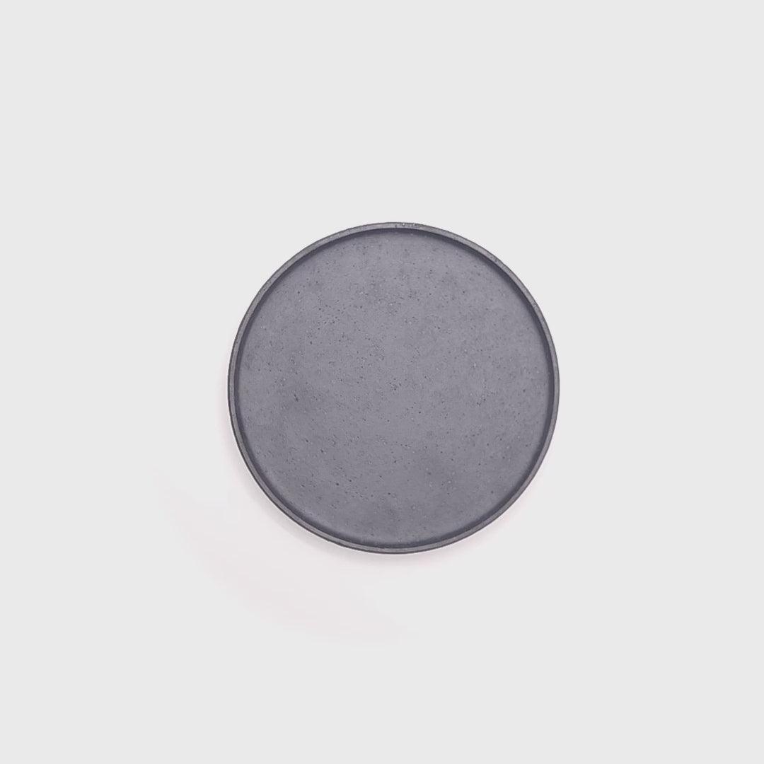 Rotating Japanese ceramic Black Round Plate. Tsukushi