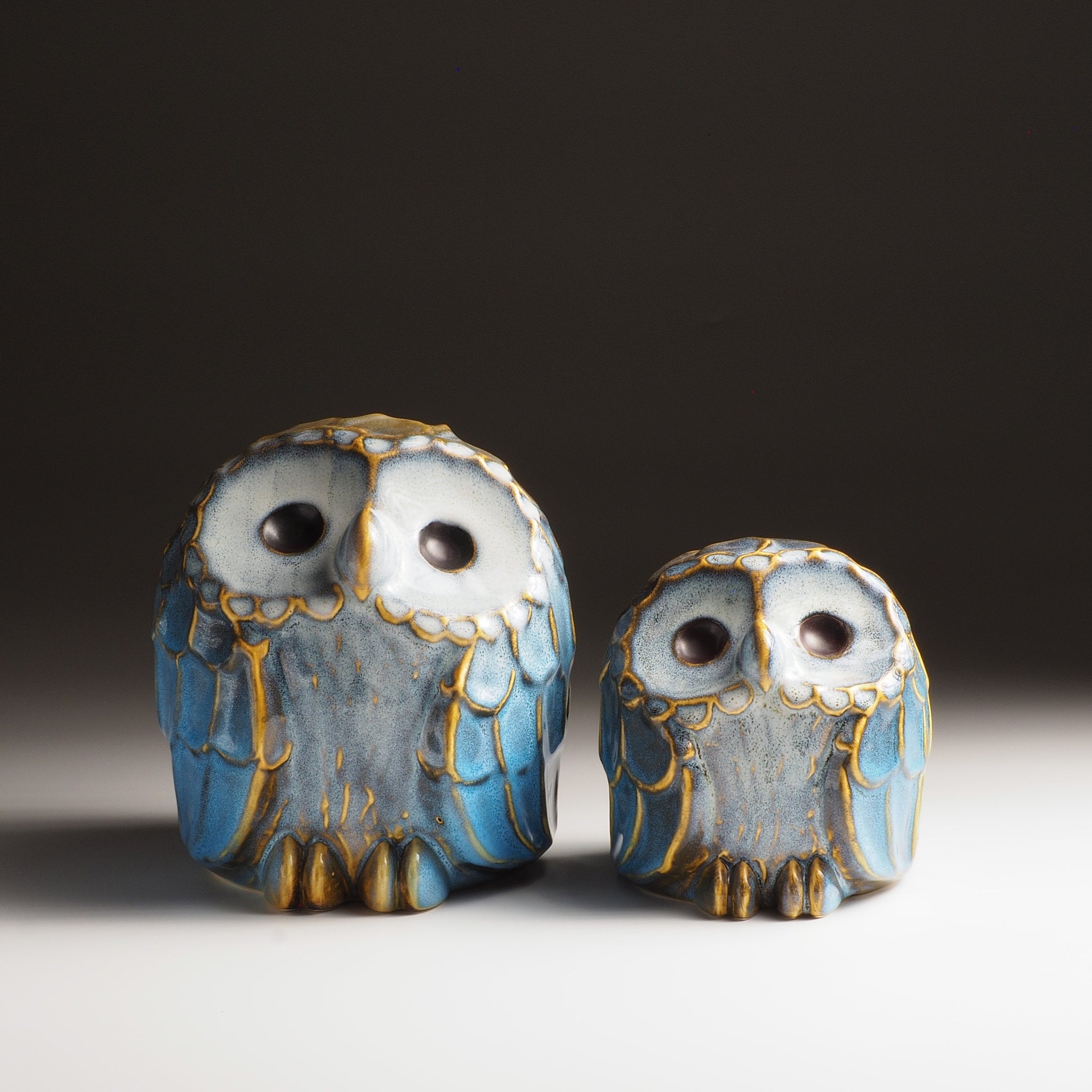 Sofuku pair of owl-shaped ceramic ornaments displayed side by side in medium and small sizes